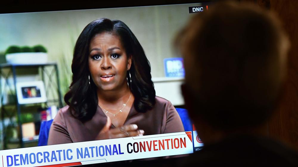 Former first lady Michelle Obama, and her necklace, urged viewers to vote on the opening night of the Democratic National Convention.