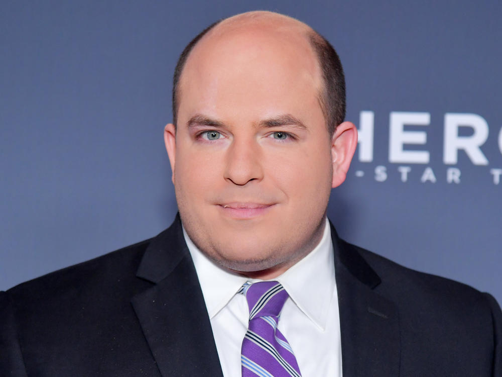 Brian Stelter, shown here in 2018, is CNN's chief media correspondent and the host of CNN's <em>Reliable Sources,</em> which focuses on how the media cover the news