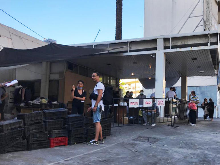 The Nation Station distributes free produce to residents of Beirut's Geitawi neighborhood. Volunteers have wired electricity throughout the dilapidated gas station, installed WiFi and created shift schedules. 