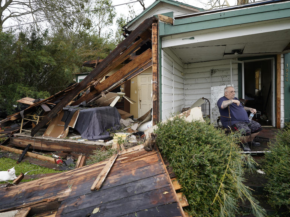 Chris Johnson views destruction at his home Thursday in Lake Charles, La., after Hurricane Laura moved through the state. Johnson stayed in his home as the storm passed.