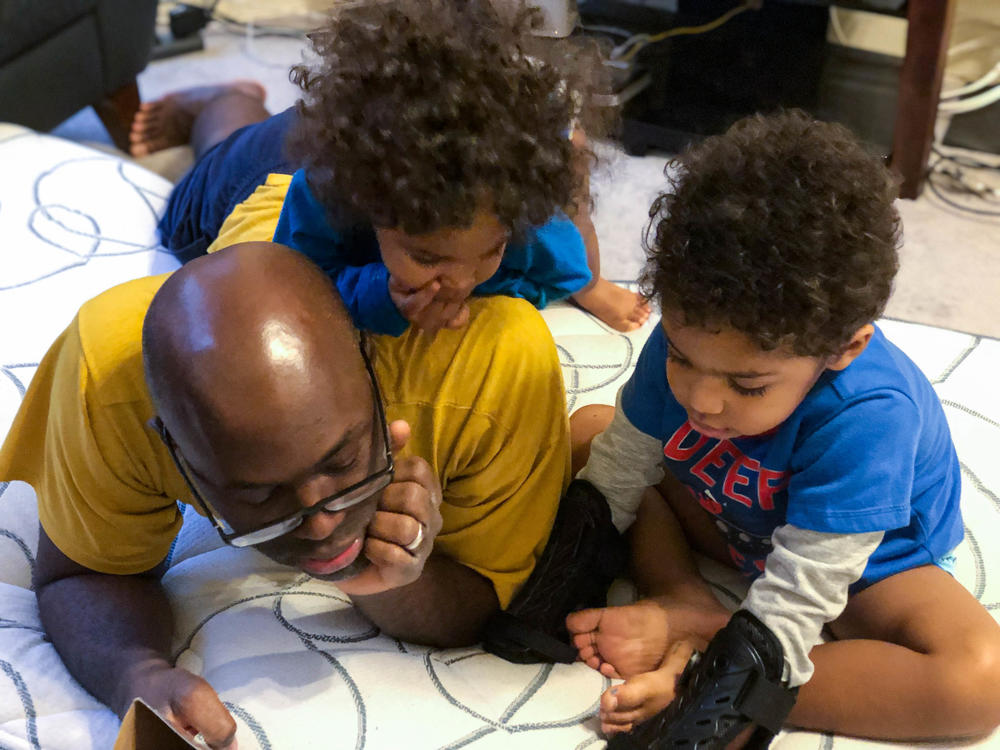 Ayim Darkeh with his children at their Brooklyn home last year.