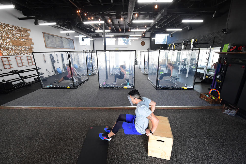 A workout class at Inspire South Bay Fitness in Redondo Beach, Calif., restricted students to plastic pods in June.
