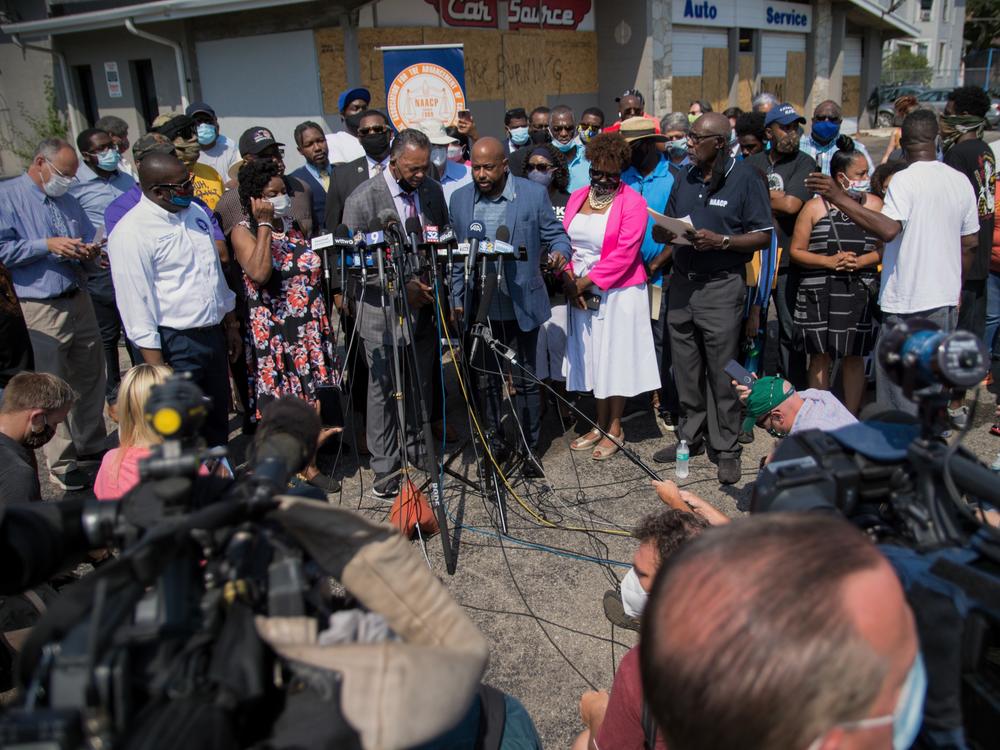The Rev. Jesse Jackson spoke at a press briefing Thursday in Kenosha, Wis., in the parking lot of Bert and Rudy's Auto Service, where two protesters were shot and killed Tuesday night.