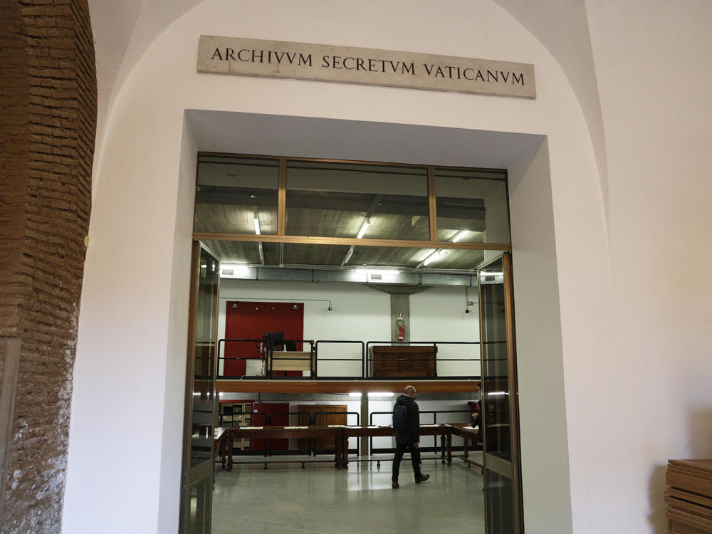 A marble plaque over the main entrance of the Vatican Archives reads in Latin 