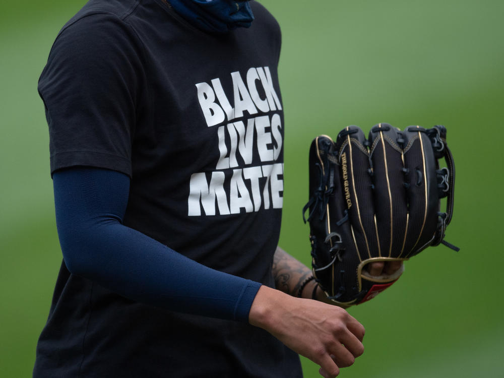 A Milwaukee Brewers player wears a Black Lives Matter shirt before a game with the Chicago White Sox earlier this month in Chicago.