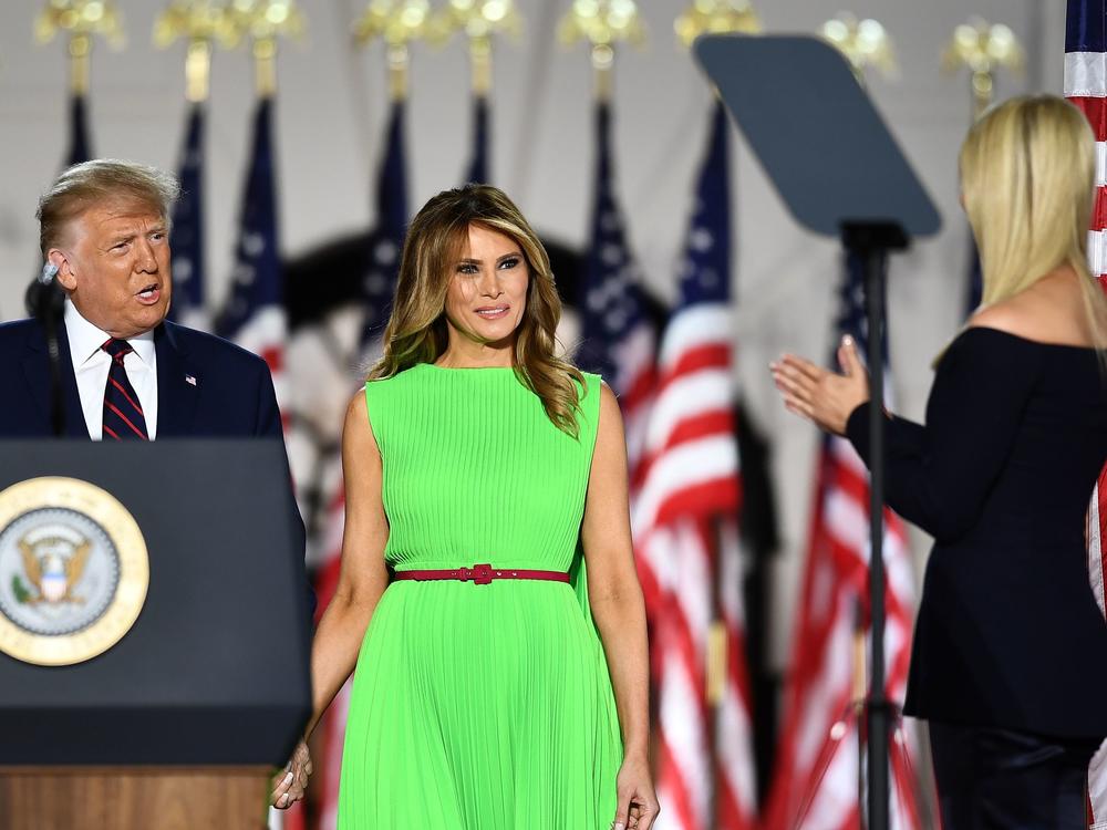 First Lady Melania Trump, center, in a bright, lime green dress at last night's Republican National Convention. It's a color begging to be photoshopped, and the Internet reliably delivered.