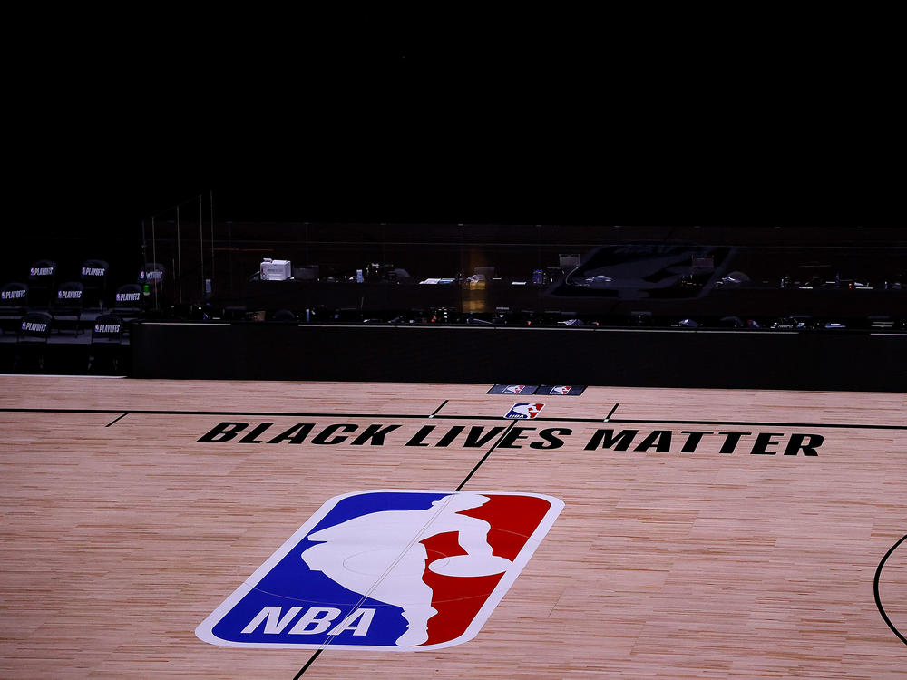 An arena is empty Thursday at the ESPN Wide World Of Sports Complex near Orlando, Fla., as all the NBA playoff games were postponed. The games are set to resume Saturday.
