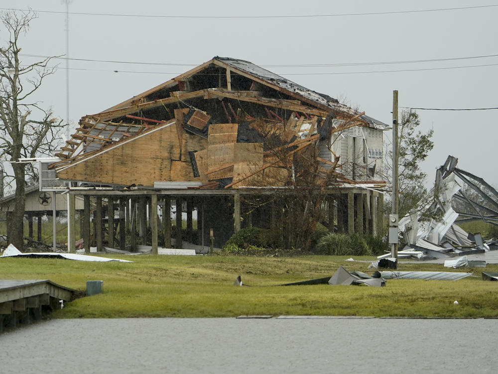 A home damaged by Hurricane Laura is seen Friday in Hackberry, La. Damage estimates from the storm range from around $4 billion to $12 billion.