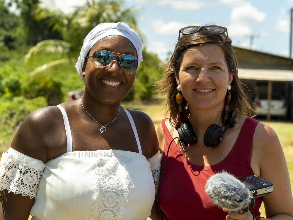 Peggy Bouva (left) and Maartje Duin traveled to Suriname together to visit a former sugar plantation once owned by Dutch nobility. Duin's great-great-great-grandmother held a share in the plantation, where Bouva's ancestors were enslaved. The two women documented their research into their shared, painful history for a podcast called 