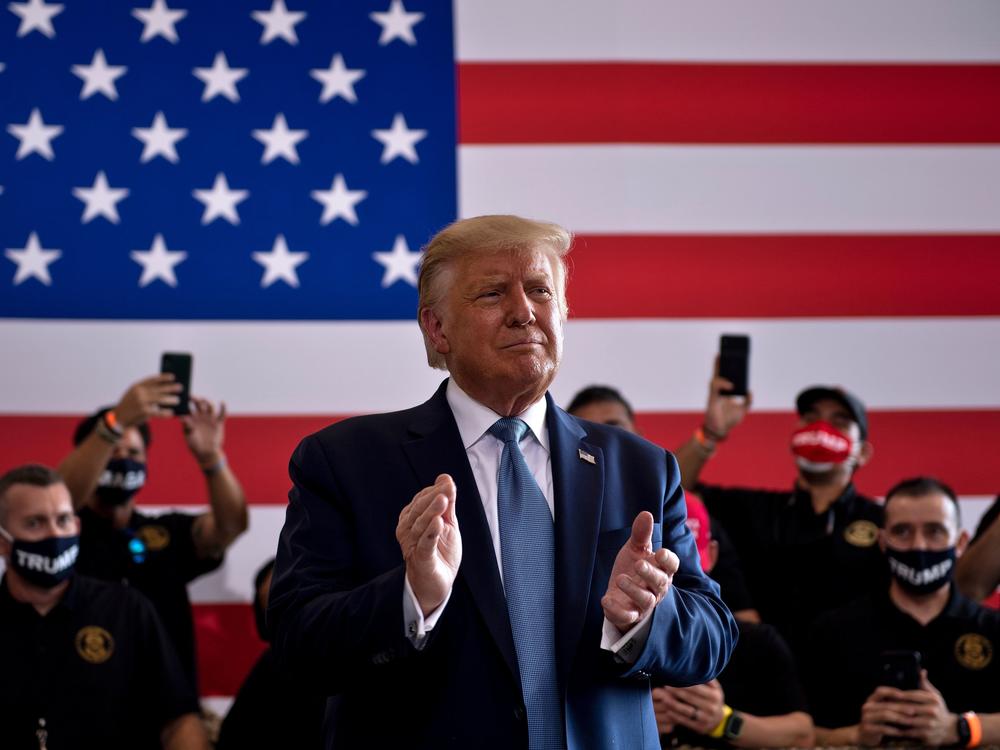 President Trump arrives for a rally at Yuma International Airport in Yuma, Ariz., on Aug. 18. Arizona has seen its share of white residents without a college degree drop. Meanwhile, its share of Latinos has risen.