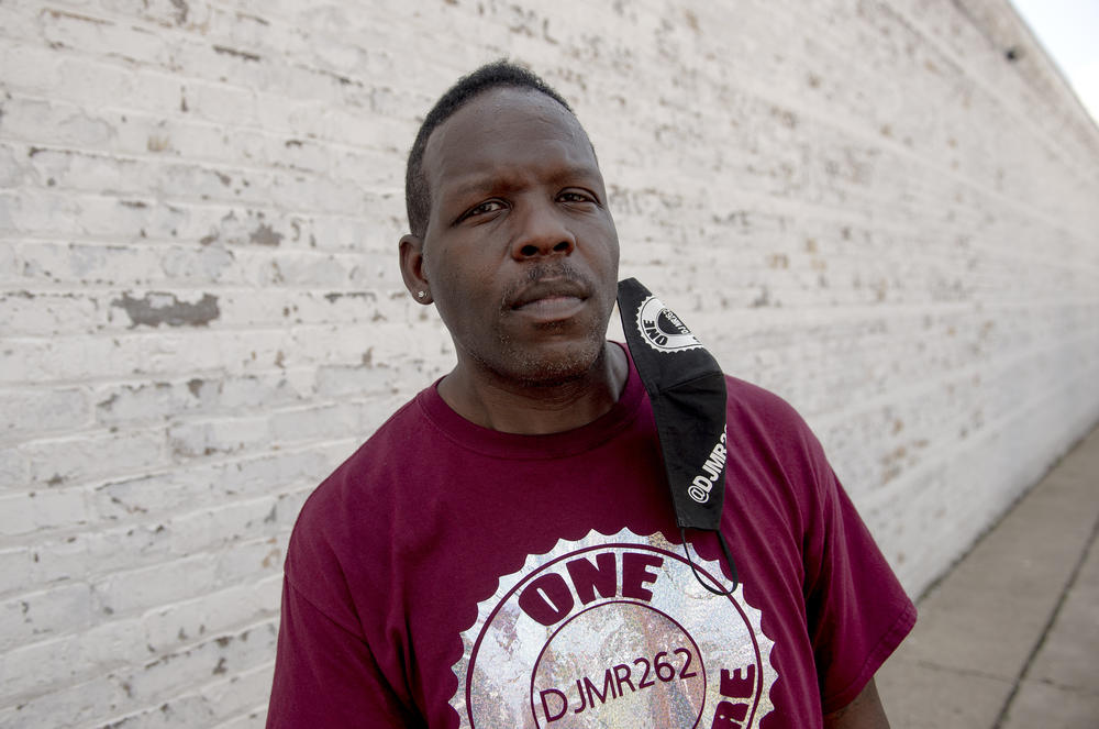 Carey Norris, also known as DJ Mr. 262, stands for a portrait in Kenosha, WI.