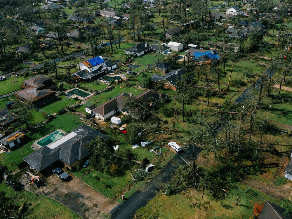 An aerial view of Lake Charles, La., shows damage to houses last week after Hurricane Laura, one of the most powerful storms ever to hit Louisiana, tore through the area.
