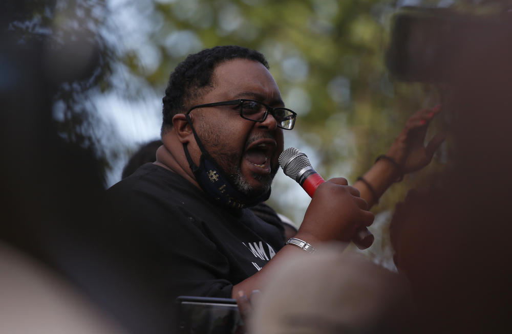 Jacob Blake Sr., the father of Jacob Blake, who was shot by police in Kenosha, Wisconsin, speaks to protesters after a march Saturday, August 29.