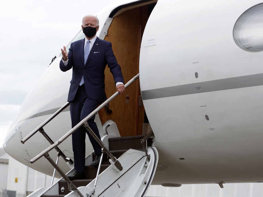Democratic presidential nominee Joe Biden, seen here on Aug. 31 in West Mifflin, Pa., set a  monthly record for presidential fundraising.