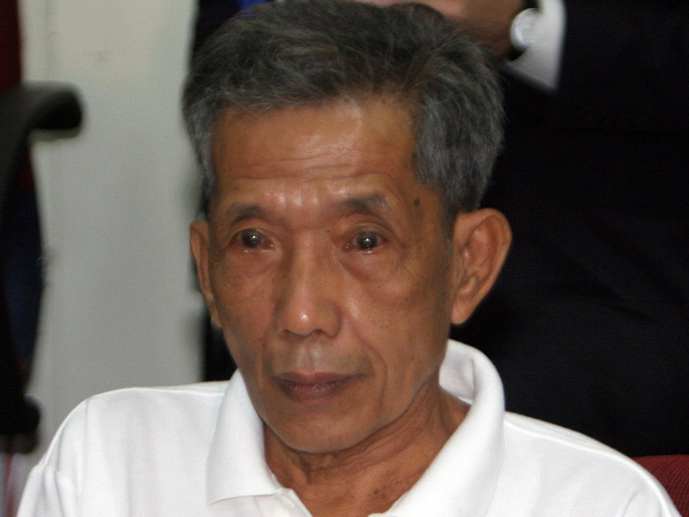 Former Khmer Rouge prison chief Kaing Guek Eav appears in a courtroom of the Extraordinary Chambers in the Courts of Cambodia in 2007.