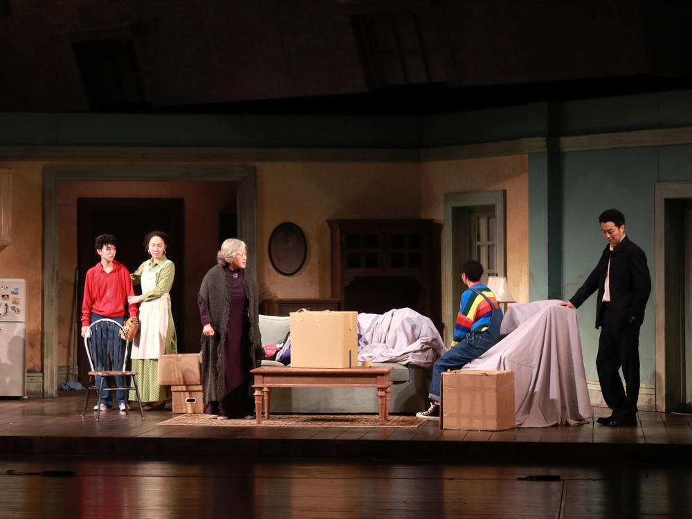 The cast of the Beijing People's Art Theatre production of <em>A Raisin in the Sun</em> rehearse onstage this past August.