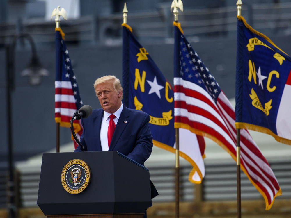 President Trump visited Wilmington, N.C., on Wednesday and urged supporters to try to vote in person after sending in a mail-in ballot — actions that would be both illegal and disruptive.