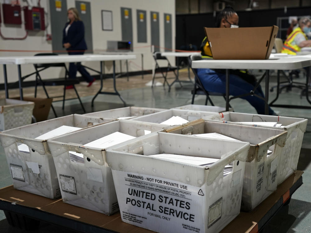 Workers prepare absentee ballots for mailing Thursday at the Wake County Board of Elections in Raleigh. Other states will soon follow North Carolina in sending out ballots as the general election voting season gets underway.