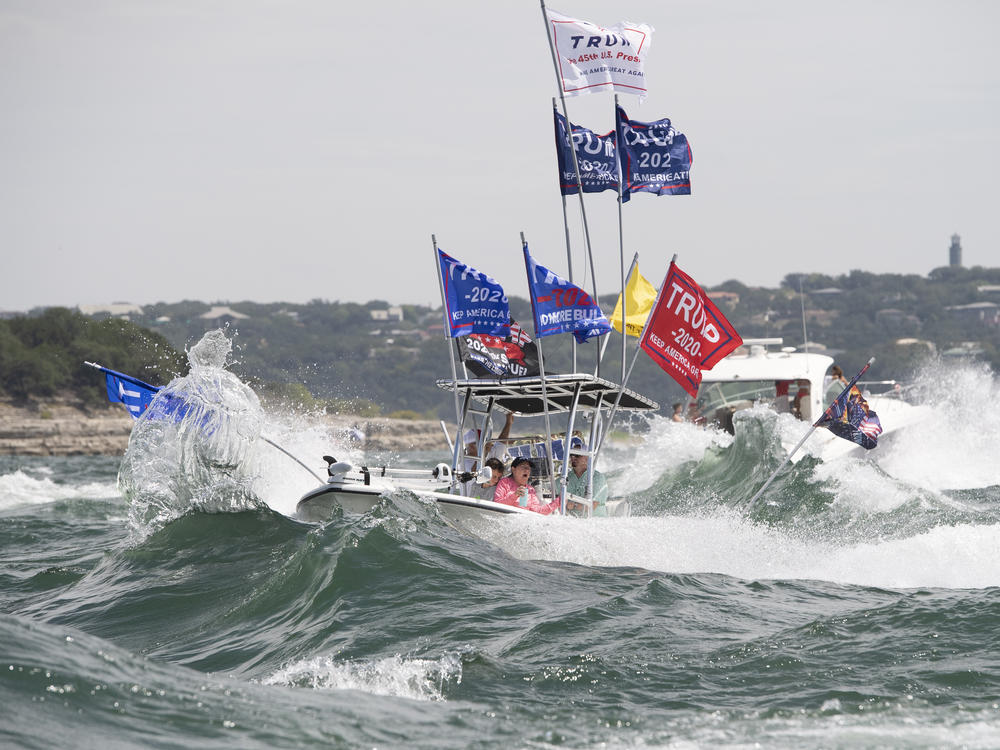 Boaters flying flags honoring President Trump crowded Lake Travis in Texas on Saturday. Although this boat did not capsize, a spokesperson for the Travis County Sheriff's Office said 