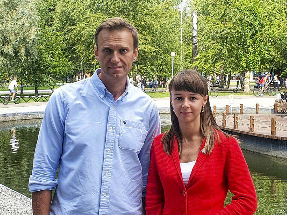 In this August photo, Alexei Navalny poses for a photo with Siberian politician Ksenia Fadeyeva. Navalny was removed from a medically-induced coma in a Berlin hospital after suffering what German authorities say was a poisoning with a chemical nerve agent while traveling in Siberia in August.