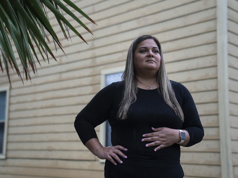 Veronica Diaz, layout editor at the Valley Morning Star, poses for a photo at her home in Harlingen, Texas.