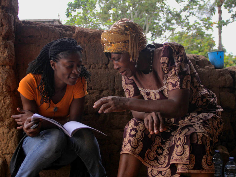 Rosine Mbakam (left) and her mother on the set of 'The Two Faces of a Bamiléké Woman,' which represents their intergenerational differences.
