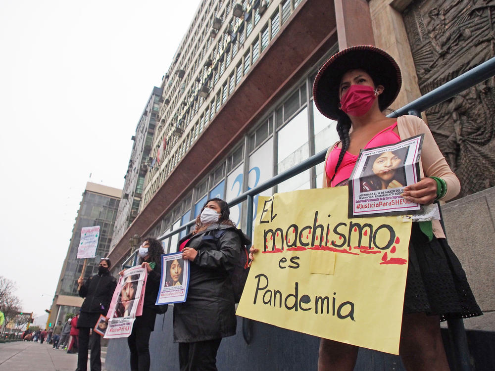 Demonstrators in front of the prosecutor's office in Lima, Peru, protest gender violence and femicide on June 20.