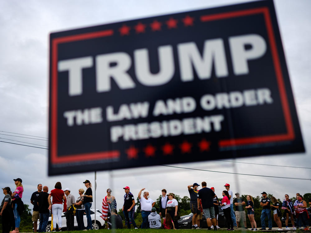 Supporters of President Trump line up outside of Arnold Palmer Regional Airport to get into a Sept. 3 rally in Latrobe, Pa.