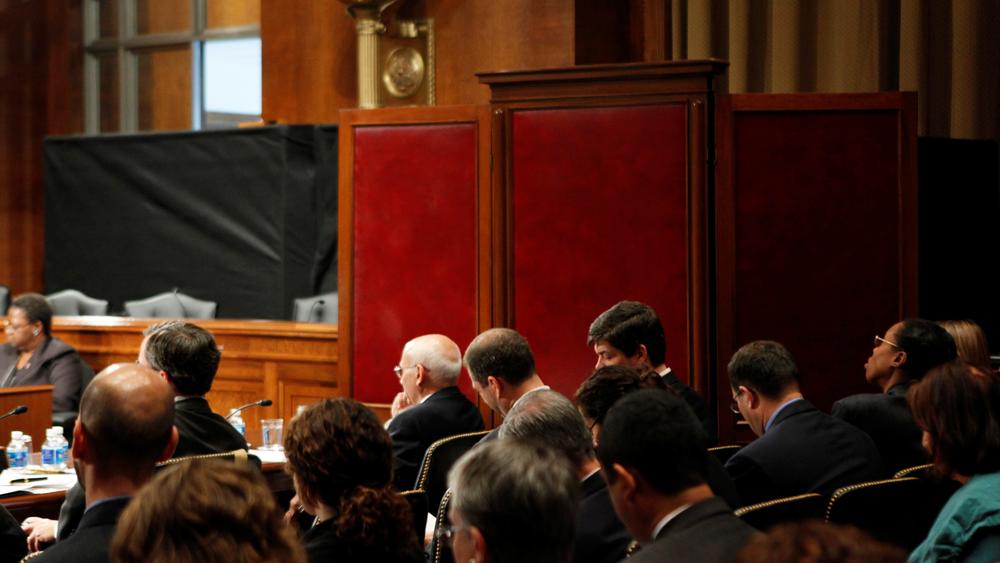 Ex-FBI agent Ali Soufan testifies on Capitol Hill in 2009 from behind a black curtain and a room divider in to protect his identity. Soufan has long argued that he was able to obtain more intelligence from suspects by building rapport than the CIA was by using waterboarding and other harsh methods.