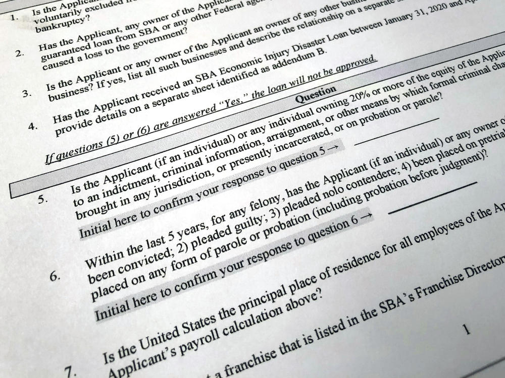 The Justice Department has accused 57 people of defrauding the Paycheck Protection Program. A portion of the program's application is shown here.