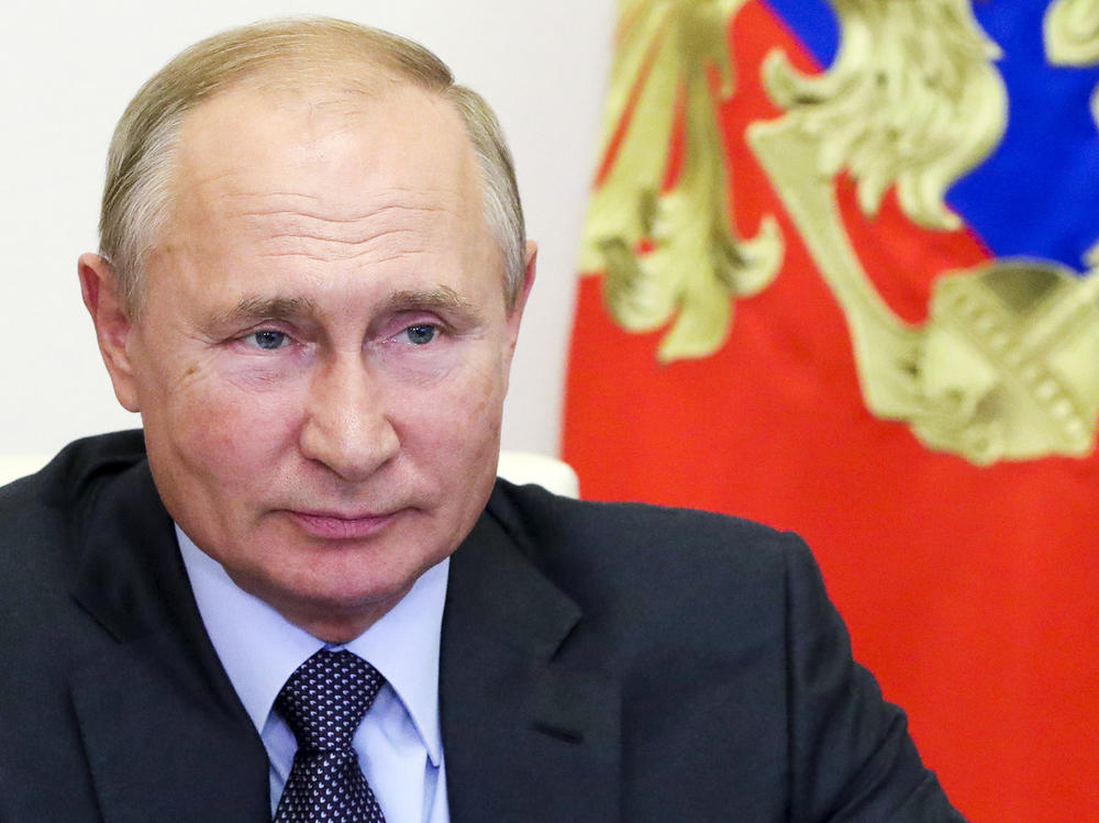 Russian President Vladimir Putin attends a meeting on economic issues via video conference Thursday at his Novo-Ogaryovo residence outside Moscow.