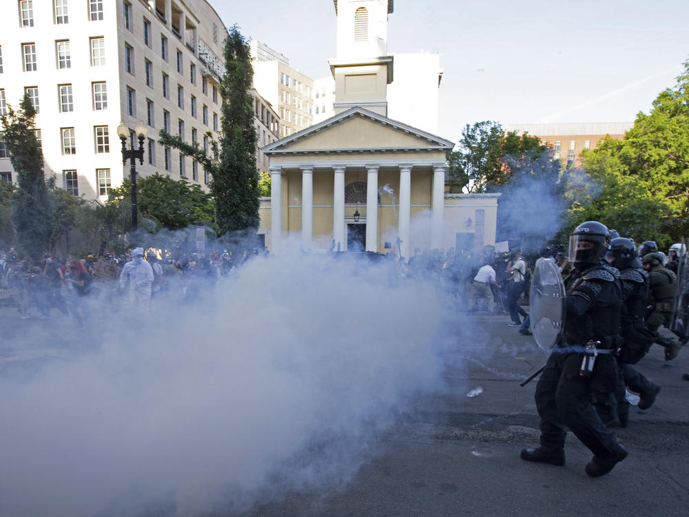 Police move in on demonstrators in Lafayette Square near the White House with tear gas and smoke on June 1. U.S. Park Police made announcements asking protesters to leave, but few people appeared to hear them.