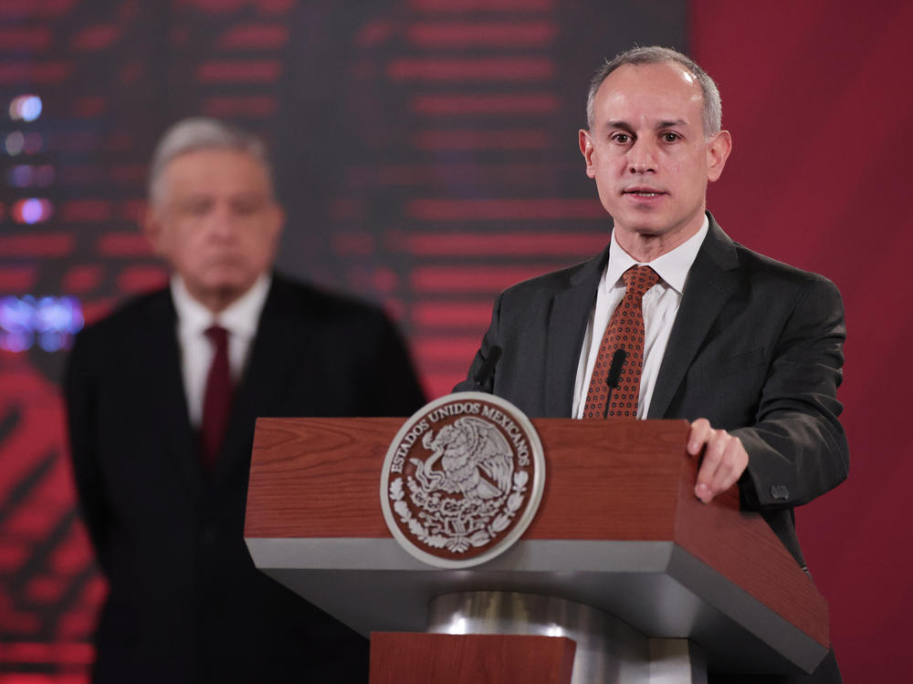 Mexico's assistant health secretary, Hugo López-Gatell, speaks about plans for Mexico to produce an experimental coronavirus vaccine developed by the University of Oxford, at the national palace in Mexico City, on Aug. 13.