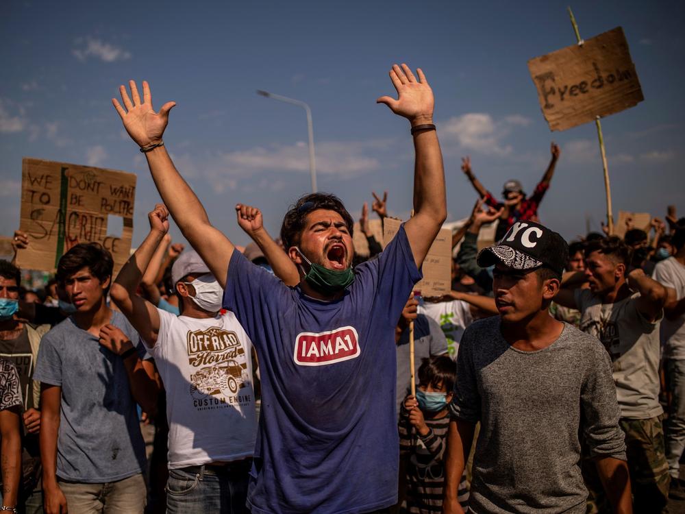 Refugees from the Moria camp protest near Mytilene on the Greek island of Lesbos on Saturday, a few days after a fire destroyed the refugee camp.