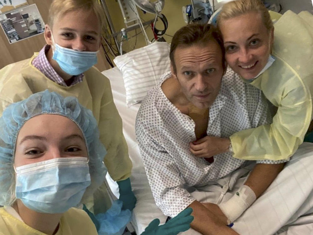 Russian opposition leader Alexei Navalny posted a photo of himself with daughter Daria, son Zahar and wife Yulia on his Instagram account Tuesday from his hospital bed in Berlin.