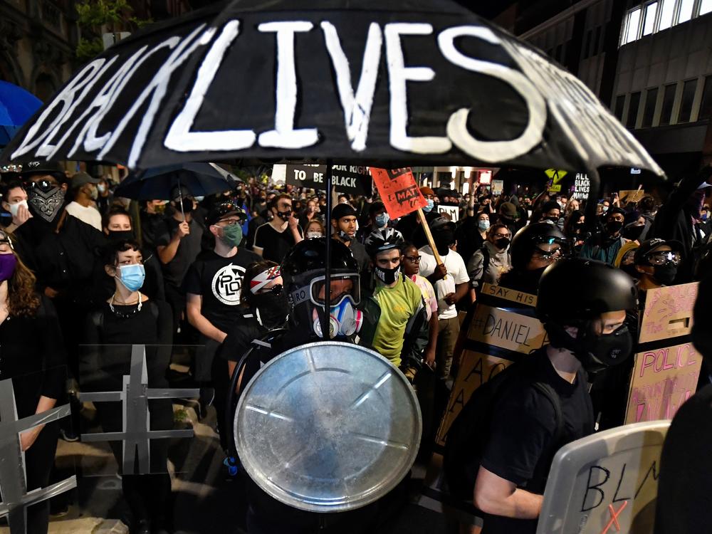 Demonstrators march through the streets of Rochester, N.Y., earlier this month protesting the death of Daniel Prude, apparently stopped breathing as police were restraining him in March.