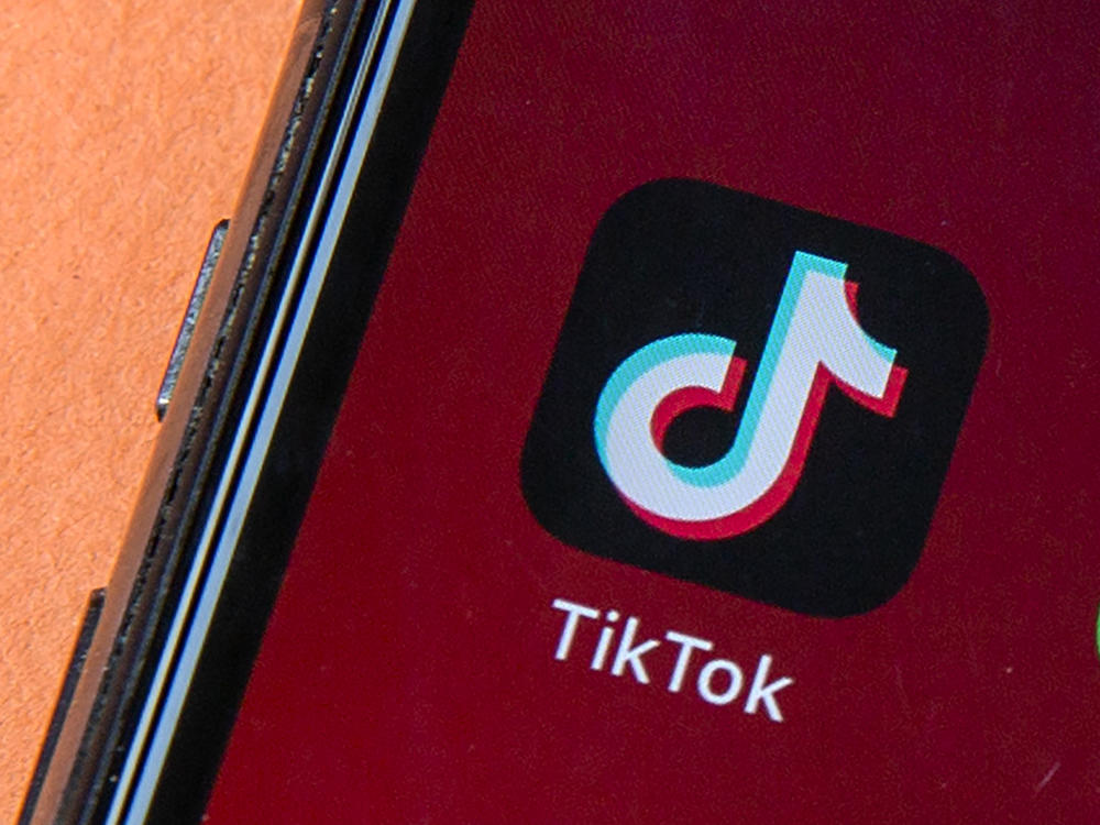 Icons for the smartphone apps TikTok and WeChat are seen on a smartphone screen in Beijing. President Trump said he does not plan to support any deal to save TikTok in the U.S. that keeps China-based ByteDance as its majority owner.