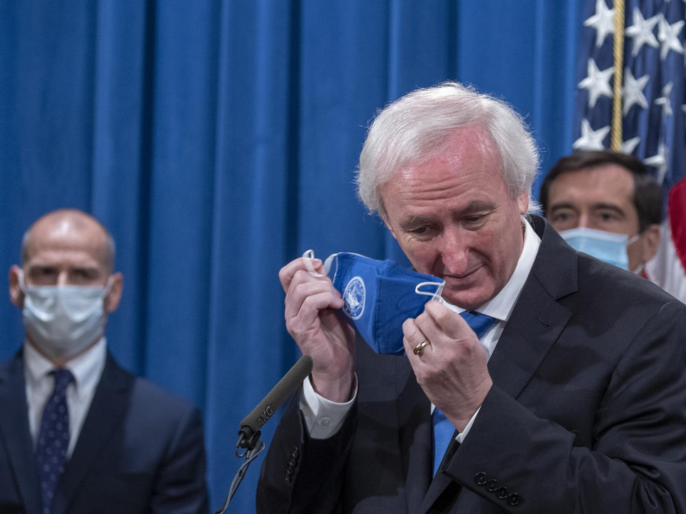 Deputy Attorney General Jeffrey Rosen announces the cybercrime allegations on Wednesday at the Justice Department.