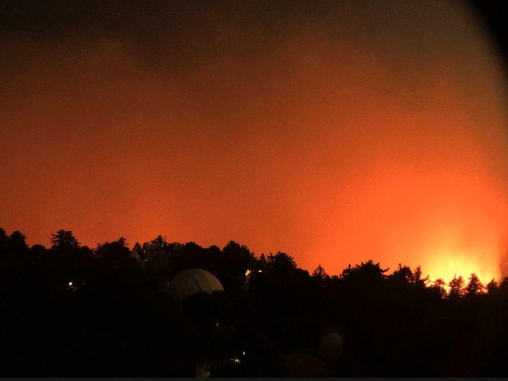A view facing east from the Mount Wilson Observatory near Los Angeles shows the nearby flames of the Bobcat Fire early Wednesday.