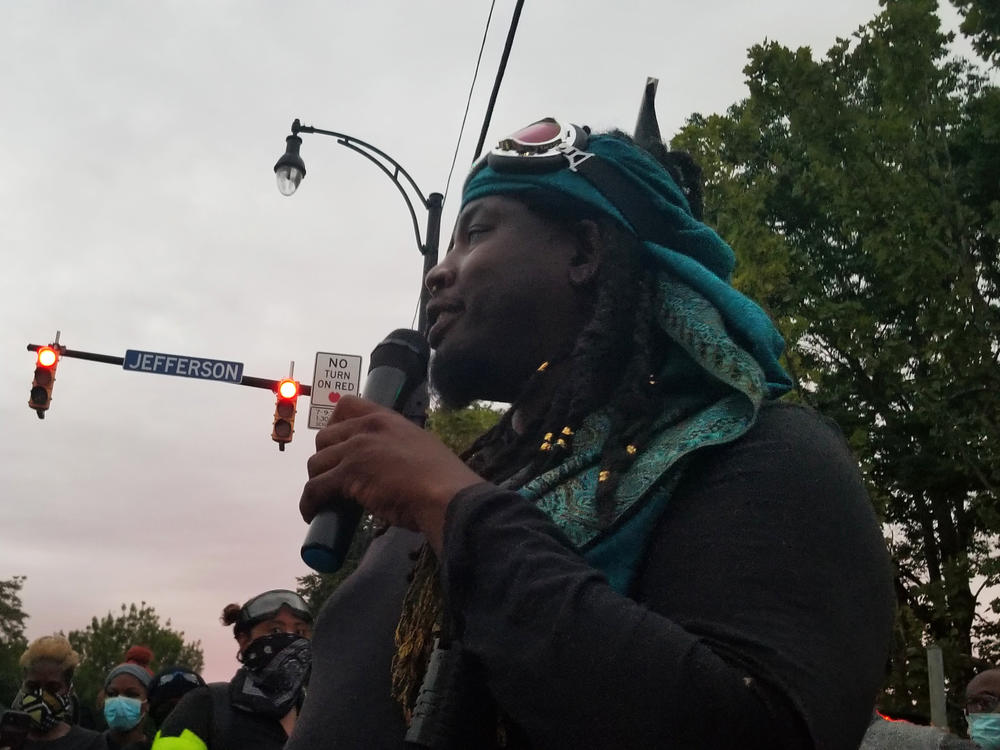 Poet and activist Christopher Coles addresses a crowd in Rochester, N.Y. His message to white protesters is a reminder: 