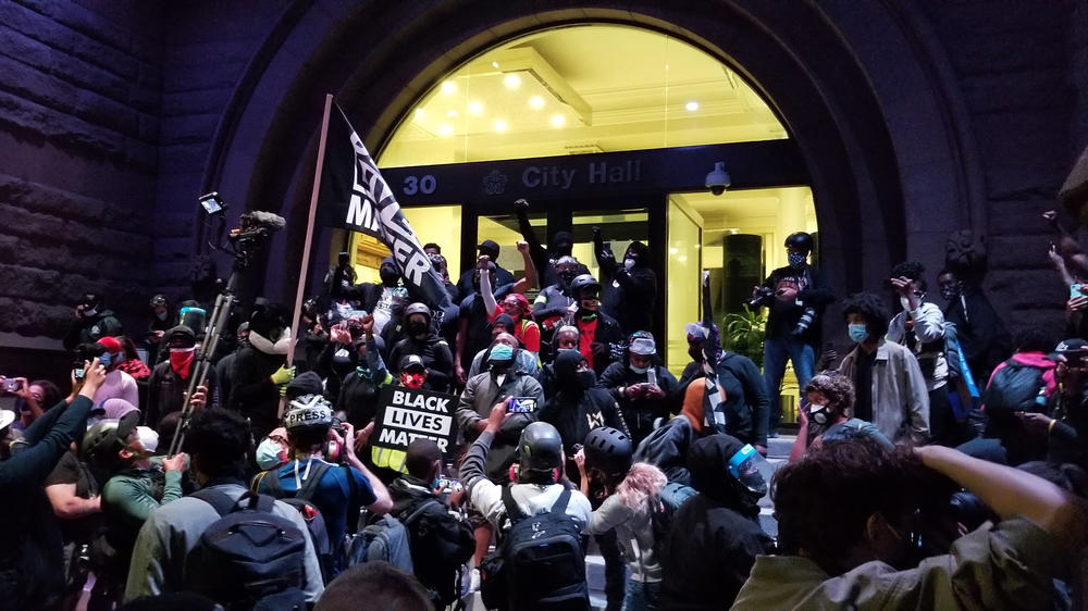 Marchers gather outside Rochester City Hall earlier this month. Some Black protest leaders worry white allies will march and carry signs but then go back to their lives, even if nothing changes to make Black people safer.