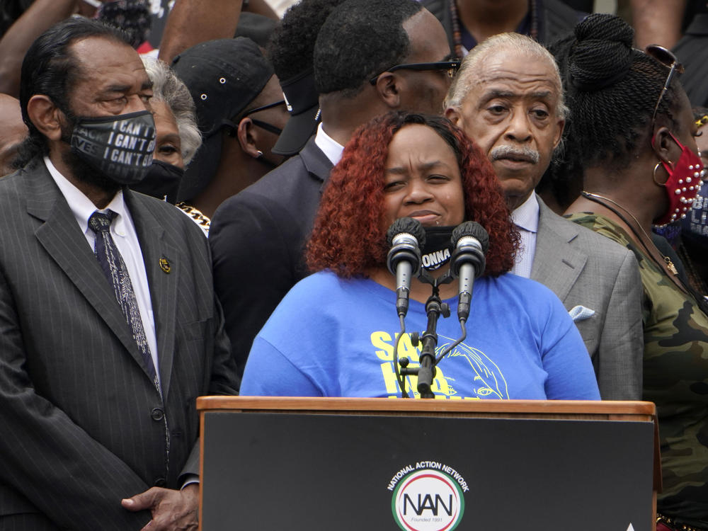 Tamika Palmer spoke at the March on Washington last month at the Lincoln Memorial in Washington, D.C. At left is Rep. Al Green, D-Texas, and at right is the Rev. Al Sharpton.