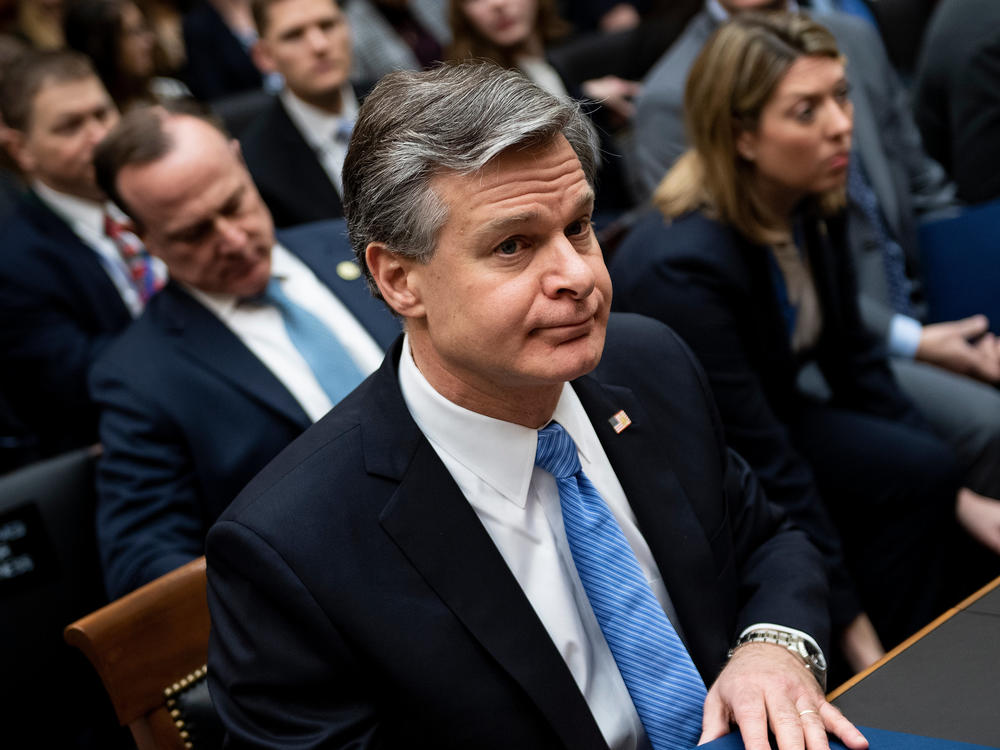 FBI Director Christopher Wray, pictured on Capitol Hill on Feb. 5, is briefing House members on security threats on Thursday.