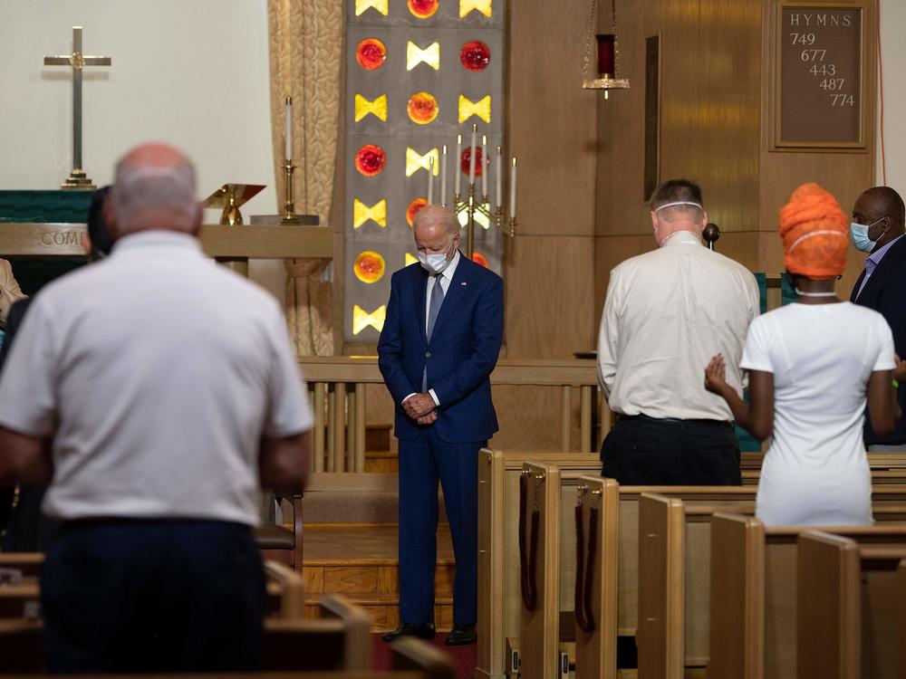 If elected, Democratic nominee Joe Biden would become only the second Catholic president in American history. Here he prays at Grace Lutheran Church in Kenosha, Wis., on Sept. 3.
