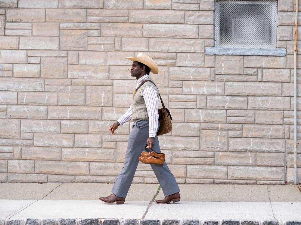 Conphidance in 'The Cowboy' episode of <em>Little America</em>, on Apple TV+