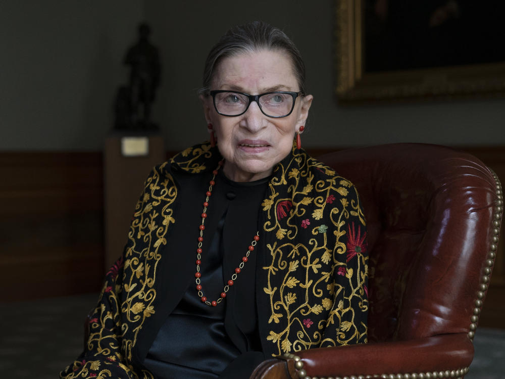 Supreme Court Justice Ruth Bader Ginsburg — here in her chambers during a 2019 interview with NPR's Nina Totenberg — died on Friday at the age of 87.