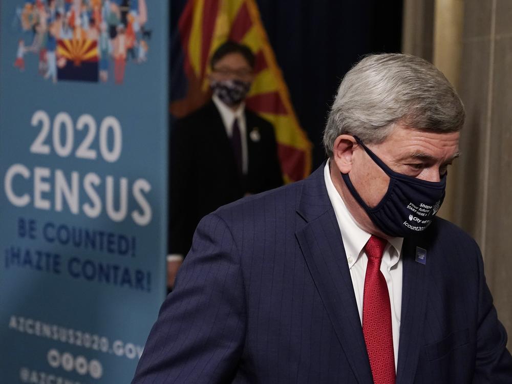 U.S. Census Director Steven Dillingham departs a Sept. 17 news conference in Phoenix. The Trump administration is facing two federal lawsuits over its last-minute decision to cut the 2020 census schedule short.