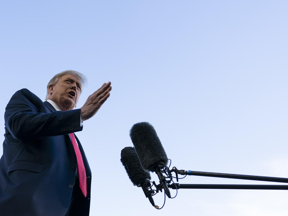 President Trump speaks with reporters on the South Lawn prior to departing the White House on Saturday.