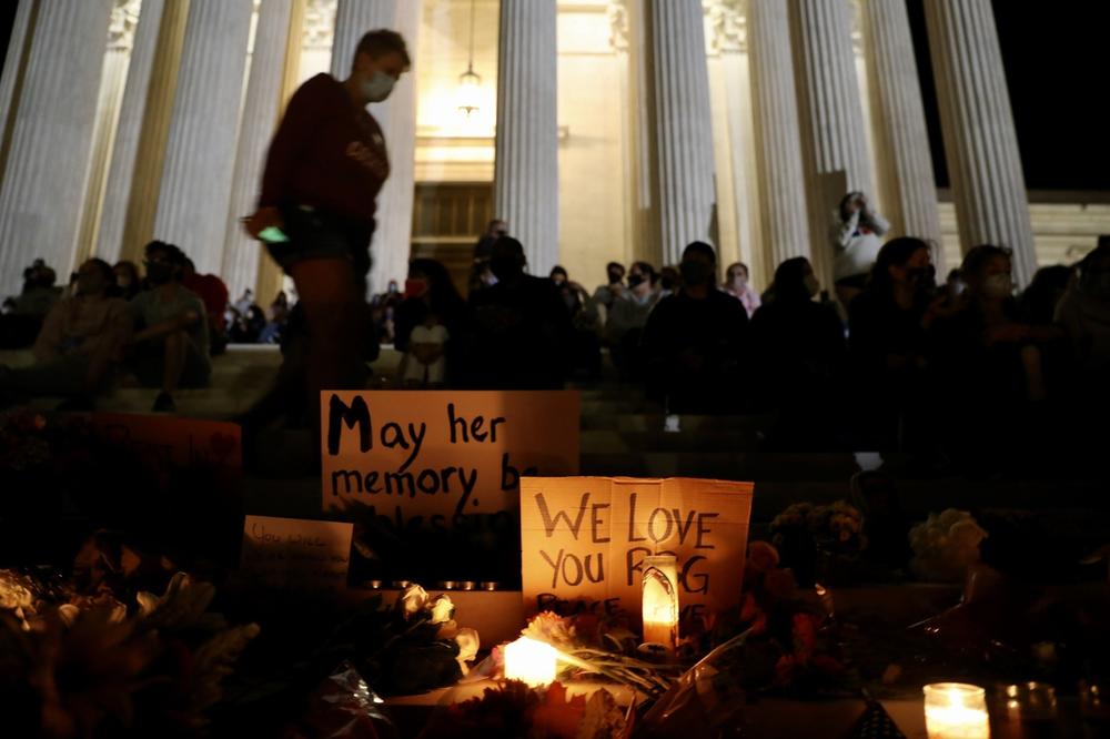 Mourners gather during a vigil for Supreme Court Justice Ruth Bader Ginsburg outside of the Supreme Court in Washington, D.C., on Friday.