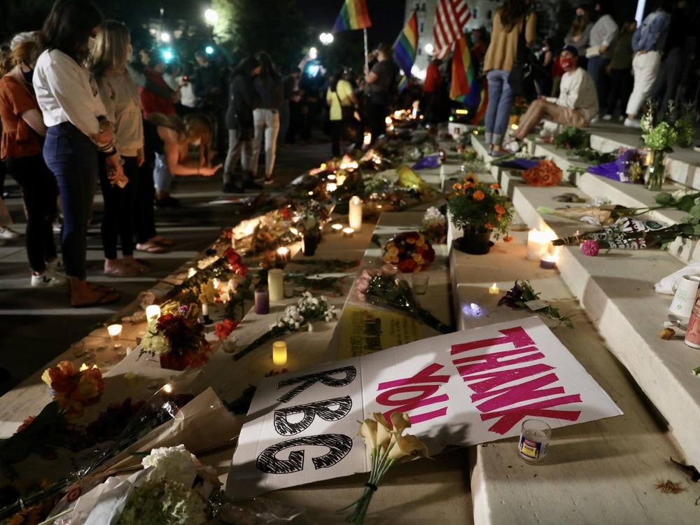 A crowd gathers at the U.S. Supreme Court to mourn the death of Supreme Court Justice Ruth Bader Ginsburg on Friday.